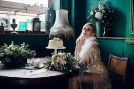 The couple wanted their wedding day to reflect classic elegance as seen in the art deco style of the 1920's. Sparkle Glitter With This Art Deco Wedding Unconventional Wedding