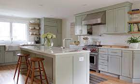 Perimeter cabinets are sherwin williams wool skein and island is sherwin williams topsail, both. Sage Green Kitchen Cabinets Transitional Kitchen