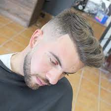 Minimize the damage on relaxed natural hair by opting for a boyish haircut that's super clean and short. 40 Spectacular Quiff Hairstyle Ideas The Most Iconic Men S Haircut