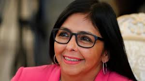 Woman comes face-to-face with bear peeking through her window