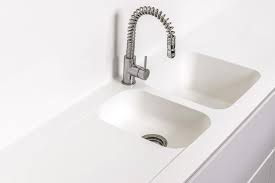 corian benchtop and integrated sinks