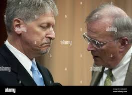 Former Durham district attorney Mike Nifong is sworn in as he takes the  witness stand in his own defense after pleading not guilty to a criminal  contempt of court charge in front