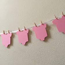 Baby showers are the kind of even that come with their own automatic theme, so they're not very hard to decorate for. Onesie Garland Onesie Banner Diy Onesie Banner Baby Shower Ban Aftcra