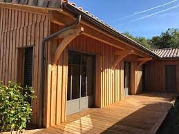 Nous proposons également un bardage composite weo : Maison A Ossature Bois A Bardage Vertical A Lacanau Realisee Par Ami Bois 33 Maison Ossature Bois Bardage Bois Exterieur Maison Bois