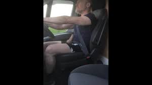 Muscular trucker bodybuilder Daddy jerks off and flexes muscles while  driving his truck.