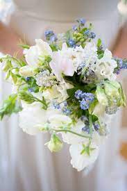 Find a bouquet to match your cool wedding palette. Light Blue And White Wedding Bouquet Deer Pearl Flowers