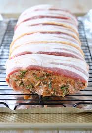 The bacon adds flavor and fat to the lean preheat your oven to 450 degrees f. Bacon Wrapped Balsamic Pork Loin Recipe Whitneybond Com