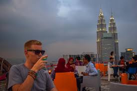 A proper bar on level 34 of menara kh and a (active) helipad on top of the building. Heli Lounge Kuala Lumpur Drinks Sunset On A Helipad