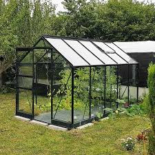 serre de jardin en verre trempe 4mm et aluminium laque noir equipee d une base au seuil de porte rabaisse d une o serre jardin idee deco jardin serre en verre