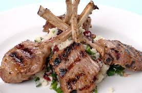 Serve lamb chops over couscous with sauce and vegetables. Cajun Lamb Cutlets Couscous Recipe Easy Dinner Ideas Nourish Magazine Australia