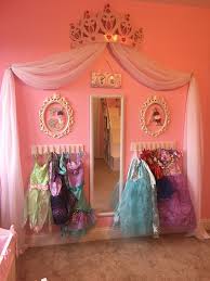 Princess Dress Up Storage Diy Cheap And Super Easy Frees Space By Putting The Dresses On The Wall Spray Painte Girls Playroom Princess Room Toddler Bedrooms