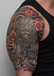 These strong, yet beautiful, tattoo designs provide the wearer with not only an awe inspiring work of art, but also a piece of chinese history. Female Foo Dog Arm Tattoo By Graynd On Deviantart Foo Dog Tattoo Foo Dog Tattoo Design Tattoos