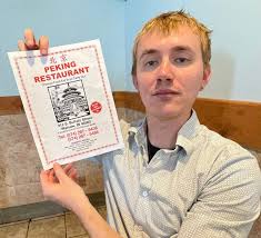 Peking-Daniel-Messenger-shows-off-the-menu