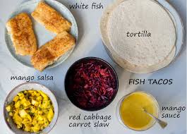 These shrimp tacos with mango salsa include chile seasoned shrimp, sweet and tangy mango salsa and a fish tacos with chipotle lime cilantro slaw | centsational style. Fish Tacos With Mango Salsa Video Everyday Delicious