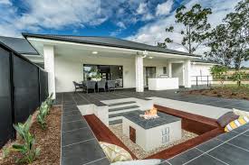 How to select a site for a sunken sandpit. Outdoor Fireplace Or Fire Pit Lounge For Winter Stroud Homes