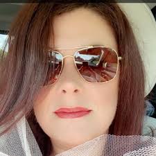 The face you make when you are trying not to sweat in your makeup and 3  layers of a fancy dress to celebrate with some amazing people who raised  over $3 million