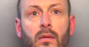 Indiana police chaplain accused of stealing clothes from Goodwill thrift  store