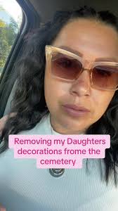Lady Removing Flowers from Mercedes Texas Cemetery Ebony Groves from  Mercedes Cemetery