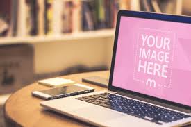 Download Laptop On Office Table Mockup Generator Mediamodifier