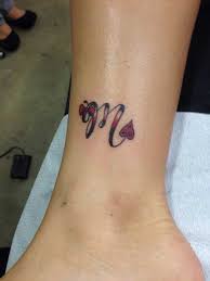 In addition, it means spiritual commitment, mindfulness, and empathy. 60 Amazing M Letter Tattoo Designs And Ideas Body Art Guru