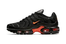 nike s air max plus dons a sleek black orange colorway nike air max mens nike shoes nike air max plus