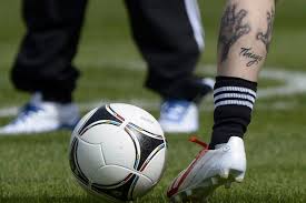 Lionel messi appears to have covered up his leg tattoos judging by photos of him training with argentina ahead of their game against brazil. Lionel Messi Tattoo Barcelona Star S New Leg Ink Sports Illustrated