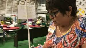 Sewing Guild uses fair booth to teach children simple sewing techniques