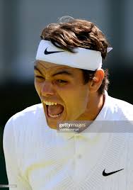 Taylor Fritz of The United States reacts in his Men's Singles second...