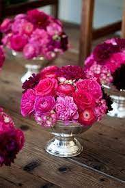 Fuchsia And Silver Wedding Theme Google Search Pink Flower Centerpieces Pink Flower Arrangements Pink Wedding Centerpieces
