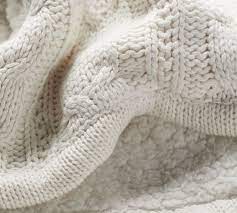 The most common cozy knitted throw material is wool. Cozy Cable Knit Throws Pottery Barn