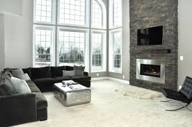 I like the idea of the black fireplace also tying in with the black walls in the music room and eventually the dark countertops in your kitchen. Brick Fireplace Painted Black Google Search Fireplace Design Stone Fireplace Designs Living Room Modern