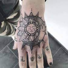 Mandala Tattoo Hand Tattoo Love Knuckle Tattoo Navy Pants Black Nail Polish Tiled Floor Mandala Hand Tattoos Mandala Thigh Tattoo Hand Tattoos