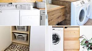 Child standing near washer and holding white towels in laundry room. 110 Ideas How To Optimize Small Laundry Room And Make It More Stylish Simphome