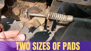 2) if the brake lever is locked on then undo the nuts either side of the caliper on the transmission. Riding Mower Brake Pad Replacement Youtube