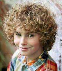 Since curly hair on adults is usually quite thick, use that to your advantage to create big swoops and gathers that come together to form a romantic crown. Pin By Melissa On Hair Make Up Curly Hair Styles Medium Hair Styles Kids Curly Hairstyles