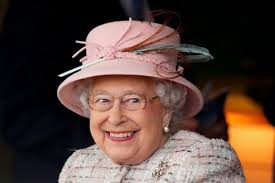 Queen Elizabeth Ii Wearing Her Glasses And Pink Coat With A Matching Hat As She Laughs Queen Elizabeth Queen Elizabeth Laughing Queen Elizabeth Ii