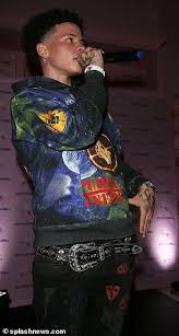 The upper side of his left forearm contains a tattoo of two hands, shaking each other with a gun behind each one, to give the effect of a. Kiss Lips Tattoo Lil Mosey Tattoo Ideen