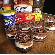 حلى الجالكسي ٥ جالكسي سادة ١ قشطة ظرف دريم ويب فنجال شاي حليب سائل كيك شوكلاتة ساريتا اوريو او دايجستڤ dessert platter arabic sweets cookout food