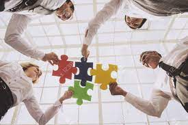 Check out our list below! Group Of Business People Assembling Jigsaw Puzzle Team Building Activities Bottom View Four Smart Cute Business Partners In Office Teambuilding Teamwork And Cooperation Concept Stock Photo Picture And Royalty Free Image Image