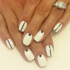 Mostly sported by girls, these feature a hoard of designs and a virtually infinite range of colors to create artistic beauty. 27 White And Black Nail Art Designs Ideas Design Trends Premium Psd Vector Downloads