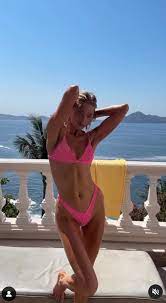 Elsa Hosk flaunts her mom bod in hot pink bikini