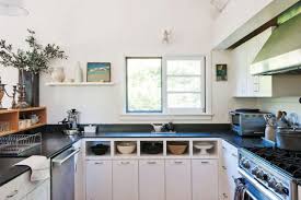 Just spin around and you can reach different cabinets, the sink, cooker, etc. Remodeling 101 U Shaped Kitchen Design