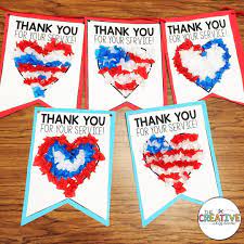 We Created Our Sweet Patriot Banner With Letters On Back To Send Off To Our Heroes Who Defend And Protect Ou Veterans Day Activities Patriots Day School Crafts