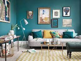 This simple living room was updated with shades of teal and small touches of lime green. Teal Living Room Ideas Teal Living Rooms Yellow Living Room Living Room Grey