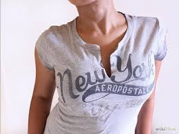 How To Give A T Shirt A More Feminine Shape T Shirt Diy Diy Shirt Ripped Shirts