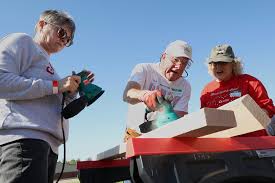 Volunteers assemble beds for Columbia's children in need