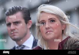 Sarah Ewart and her solicitor Darragh Mackin outside the High Court in  Belfast after her case was upheld, where the court has ruled that Northern  Ireland???s strict abortion law breaches the UK???s