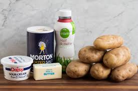 Slowly add in the warm liquids while mashing. Mashed Potatoes Recipe Cooking Classy