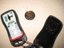 You pop the key out the back of your fob and use a dime and twist in the thin slot below the key hole, it pops a small cover off the bottom/back of the fob, that is. Nissan Armada Key Fob Battery Replacement Guide 005