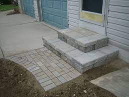 Discover the versatility of patio pavers with these 25 beautiful examples of backyard spaces designed with various it's a big step out the back door: Brick Pavers Ann Arbor Canton Patios Repair Cleaning Sealing Patio Repair Patio Pavers Design Porch Steps